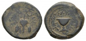 Judaea, Jewish War, 66-70 Eighth Shekel 69-70 (year 4), Æ 20mm., 5.33g. Cup with pearled rim. Rev. Bundle of lulav; on both sides, ethrog. Meshorer 21...