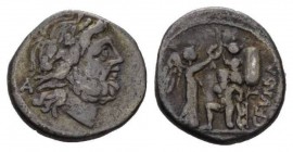 C. Fundanius. Quinarius 101, AR 15mm., 1.81g. Laureate head of Jupiter r.; behind, A Rev. C·FVNDA Victory r., holding palm branch and crowning trophy....