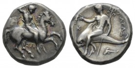 Calabria, Tarentum Nomos 315-300, AR 20mm., 7.85g. Naked ephebos on prancing horse r., holding in l. hand, reins shield and two spears and striking wi...