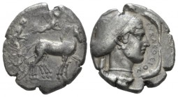 Sicily, Syracuse Tetradrachm circa 425-400, AR 25mm., 16.62g. Slow quadriga right, horses crowned by Victory. Rev. Head of Arethusa right, wearing sac...