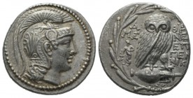 Attica, Athens Tetradrachm 135-134, AR 29.5mm., 16.85g. Helmeted head of Athena r. Rev. Owl standing r., head facing, on amphora; in fields, magistrat...