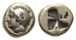 Ionia, Phocaea Hecte fouree circa 477-388, EL 10.5mm., 2.09g. Head of Athena l., wearing Attic crested helmet; below neck truncation, seal. Rev. Quadr...