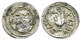 Judaea, The Bar Kokhba War Judah Zuz (denarius) 134-135 (undated, attributed to year 3), AR 20mm., 3.15g. Legend within a wreath of thin branches. Rev...