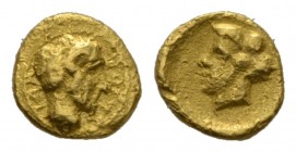 Cyrenaica, Cyrene 1/10 Stater circa 331-322, AV 8.5mm., 0.82g. API-ΣTIOΣHead of Apollo Karneios r. Rev. Head of Kyrene r. Naville 17. SNG Cop. 1195. B...