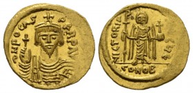 Phocas, 602-610 Solidus Constantinople 607-609, AV 21.5mm., 4.46g. dN FoCAS - PERP AVG Crowned, draped and cuirassed facing bust; holding globe crucig...