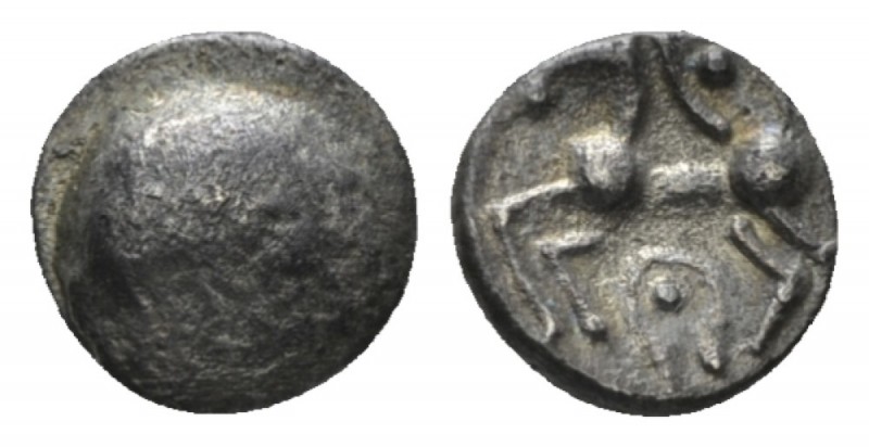 Celtic, Boii Obol II cent. BC, AR 9.5mm., 0.92g. Circular raised area. Rev. Hors...