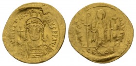 Justinian I, 1 August 527 – 14 November 565 Solidus Constantinople 545-565, AV 21mm., 4.47g. D N IVSTINI – ANVS PP AVG Helmeted, pearl-diademed and cu...