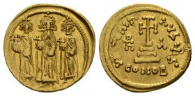 Heraclius, 610 – 641, and associate rules Solidus Constantinople 639-641, AV 20mm., 4.46g. Heraclius standing facing between Heraclonas on l. and Hera...