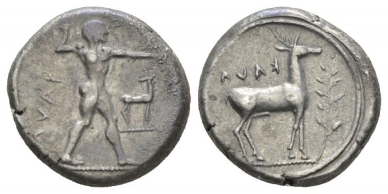 Bruttium, Caulonia Nomos circa 475-425, AR 20mm., 7.99g. Apollo advancing r., ho...