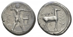 Bruttium, Caulonia Nomos circa 475-425, AR 20mm., 7.99g. Apollo advancing r., holding branch in right hand, small daimon running right on extended l. ...