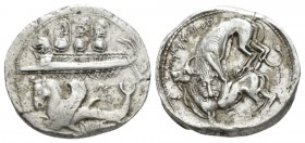 Phoenicia, Uzzibaal, circa 365-350. Byblus Shekel 365-350, AR 25.5mm., 13.24g. Galley l. with helmeted hoplites, holding shield; below, winged sea-hor...