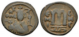 Temp. Abd Al-Malik Ibn Marwan, 685-705 Fals circa 690, Æ 22mm., 4.25g. Facing bust Emperor. Rev. Monogram. Walker type 57.

Very Fine.

 

In ad...
