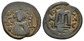Temp. Abd Al-Malik Ibn Marwan, 685-705 Fals circa 690, Æ 20mm., 4.55g. Facing bust of Emperor. Rev. Monogram. Walker type 59.

Very Fine.

 

In...