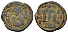 Temp. Abd Al-Malik Ibn Marwan, 685-705 Fals circa 690, Æ 21.5mm., 4.99g. Facing bust of Emperor. Rev. Monogram. Walker type 62.

Very Fine.

 

...