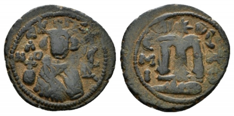 Temp. Abd Al-Malik Ibn Marwan, 685-705 Fals circa 690, Æ 21.5mm., 3.41g. Facing ...