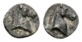 Calabria, Tarentum 3/4 Obol circa 325-280, AR 8mm., 0.37g. Horse's head r. Rev. Horse's head r.; before, Θ Vlasto 1714. Historia Numorum Italy 981.
...