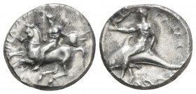 Calabria, Tarentum Nomos circa 280-272, AR 21mm., 7.81g. ΦIΛΩN Nude warrior, holding round shield, on horseback l.; behind, EY . Rev. TAPAΣ Taras on d...