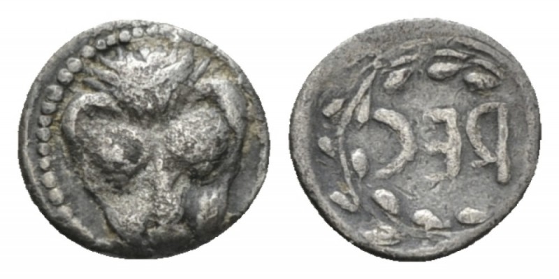 Bruttium, Rhegium Litra circa 450-445, AR 10.5mm., 0.65g. Lion mask. Rev. REC re...