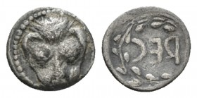 Bruttium, Rhegium Litra circa 450-445, AR 10.5mm., 0.65g. Lion mask. Rev. REC retrograde within wreath. Historia Numorum Italy 2479.

Scarse. Very F...