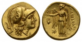 Kingdom of Macedon, Alexander III, 336-323 Uncertain mint in Greece or Macedonia Stater circa 310-275, AV 18mm., 8.59g. Head of Athena r., wearing nec...