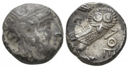 Attica, Athens Tetradrachm circa 336-297, AR 21.5mm., 17.22g. Helmeted head of Athena r. Rev. AΘE Owl, standing r., in upper l. field, olive sprig and...