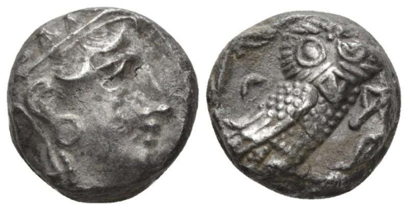 Attica, Athens Tetradrachm circa 336-297, AR 20mm., 17.20g. Helmeted head of Ath...