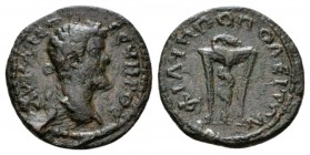 Thrace, Philippopolis Septimius Severus, 193-211 Bronze 193-211, Æ 20.5mm., 4.26g. Laureate bust r. Rev. Tripod with serpent entwined round l. leg. Va...