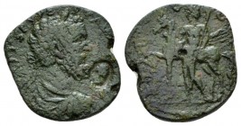 Corinthia, Corinth Septimius Severus, 193-211 Bronze 193-211, Æ 24.5mm., 9.12g. Laureate, draped and cuirassed bust r.; in fron countermak, small head...