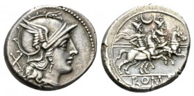 Denarius circa 207, AR 19.5mm., 4.36g. Helmeted head of Roma r.; behind, X. Rev. The Dioscuri galloping r.; above, crescent and below, ROMA in partial...