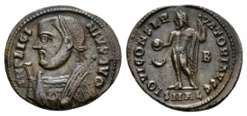 Licinius, 308-324 Follis Alexandria 317-320, Æ 20mm., 3.26g. Laureate and draped bust l., holding globe and mappa. Rev. Jupiter standing l., holding g...