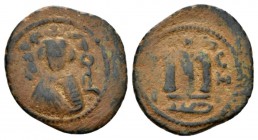 Temp. Abd Al-Malik Ibn Marwan, 685-705 Fals Emesa circa 690, Æ 21.5mm., 3.82g. Facing bust of Emperor. Rev. Monogram. Walker type 62.

Very Fine.
...