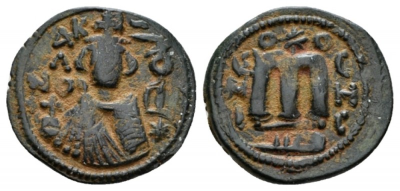 Temp. Abd Al-Malik Ibn Marwan, 685-705 Fals Emesa circa 690, Æ 22mm., 3.82g. Fal...