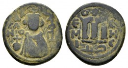 Temp. Abd Al-Malik Ibn Marwan, 685-705 Fals Emesa circa 690, Æ 20mm., 4.56g. Facing bust of Emperor. Rev. Monogram. Walker type 69.

Very Fine.

 ...