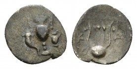 Apulia, Canusium Obol circa 300-250, AR 9.5mm., 0.28g. Cantharus. Rev. Lyre. Historia Numorum Italy 657. Lockett 113. SNG ANS 692.

Very rare. Toned...