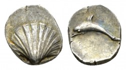 Calabria, Tarentum Litra circa 325-280, AR 9.5mm., 0.79g. Cockle shell. Rev. Dolphin leaping l. Vlasto -. Historia Numorum Italy 979.

Rare. Old cab...