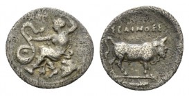 Sicily, Selinus Litra circa 400, AR 11.5mm., 0.68g. Nymph seated l. on rock, her r. hand touching serpent; above, selinon leaf. Rev. ΣEΛINOΣ Man-heade...