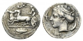 Sicily, Syracuse Hemidrachm circa 410-405, AR 16mm., 1.88g. Charioteer driving quadriga l.; above, Nike flying r. to crown him; in exergue, shield. Re...