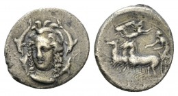 Sicily, Syracuse Hemidrachm circa 405., AR 15mm., 2.08g. Head of Athena facing three quarters l.; around, four dolphin, in field, Σ-Y. Rev. Charioteer...
