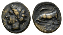 Sicily, Syracuse Bronze 317-289, Æ 15mm., 3.31g. ΣYPAKOΣIΩN Head of Persephone l., wearing an earring and a necklace. Rev. Bull butting l; abovve dolp...