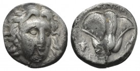 Caria, Ainetor, magistrate Rhodes Drachm 205-188, AR 18.5mm., 6.55g. Head of Helios facing slightly r. Rev. ΑΙΝΗΤΩΡ Rose with bud right and butterfly ...