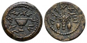 Judaea, Jewish War, 66-70 1/8 Shekel 69-70 (year 4), Æ 20.5mm., 6.72g. Cup with pearled rim. Rev. Bundle of lulav between two ethrogs. Meshorer 214. H...