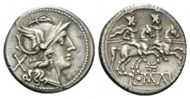 Denarius circa 206-195, AR 20mm., 4.11g. Helmeted head of Roma r.; behind, X. Rev. The Dioscuri galloping r.; below, eight-rayed star and ROMA in part...