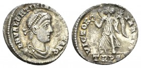 Valentinian II, 375-392 Siliqua Treveri 375-383, AR 18mm., 1.91g. Pearl-diademed, draped, and cuirassed bust r. Rev. Victory advancing l., holding wre...