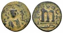 Temp. Abd Al-Malik Ibn Marwan, 685-705 Fals circa 690, Æ 20mm., 4.15g. Facing bust of Emperor. Rev. Monogram. Walker type 67.

Very Fine.

 

In...