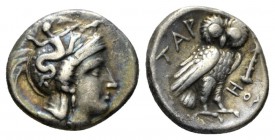 Calabria, Tarentum Drachm circa 302-280, AR 17mm., 3.13g. Head of Athena r., wearing crested Attic helmet decorated with Skylla. Rev. TAP Owl standing...