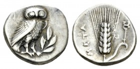 Lucania, Metapontum Drachm circa 325-275, AR 15.5mm., 3.21g. Owl standing r. on olive twig. Rev. META Barley ear; in r. field, caduceus. Johnston F1. ...