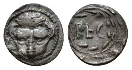Bruttium, Rhegium Litra circa 445-435, AR 12mm., 0.72g. Facing lion-mask. Rev. RECI all within wreath. SNG ANS 651. Historia Numorum Italy 2490.

To...