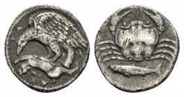 Sicily, Agrigentum Hemidrachm circa 420-406, AR 14.5mm., 1.96g. AK – PA Eagle flying l., tearing hare. Rev. Crab; below, fish. SNG ANS 1002. SNG Copen...