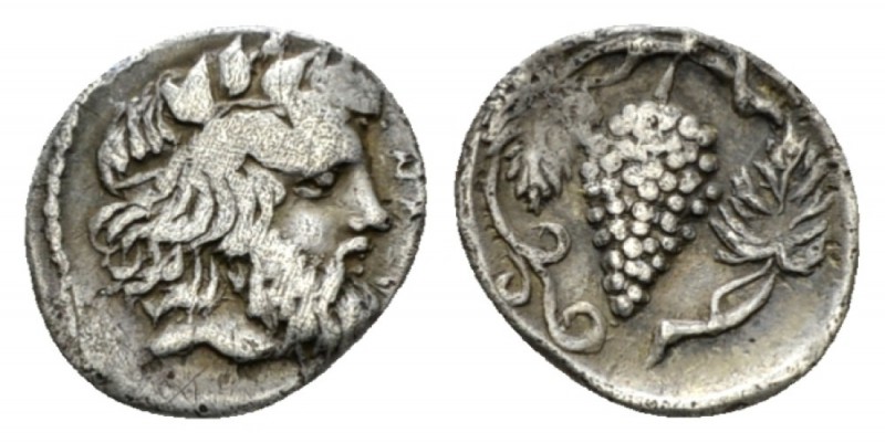 Sicily, Naxos Litra circa 415-403, AR 12mm., 0.82g. NAΞI Laureate head of Dionys...