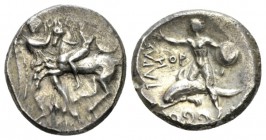 Calabria, Tarentum Nomos circa 302-280, AR 20mm., 7.81g. Helmeted horseman with shield and spear on prancing horse restrained by Nike standing l. befo...